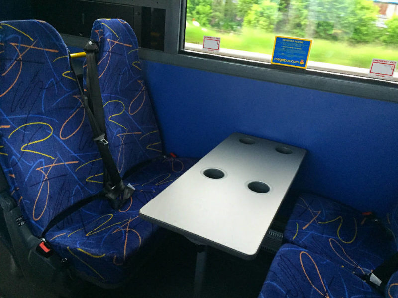 Interior of double decker Megabus and table